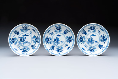 Five Chinese blue and white cups and saucers, Kangxi mark, 19th C.