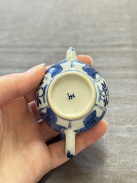 Three Chinese blue and white teapots, a cup and a saucer, Kangxi
