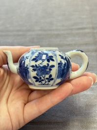 Three Chinese blue and white teapots, a cup and a saucer, Kangxi
