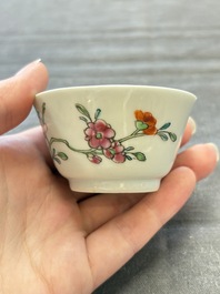 Seven Chinese famille rose cups and eleven saucers with floral design, Qianlong