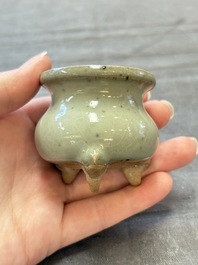 A small Chinese green-glazed 'jun' tripod censer, Hebi kilns, Song/Yuan