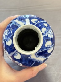 Three Chinese blue and white 'plum blossom' vases and covers, Kangxi mark, 19th C.