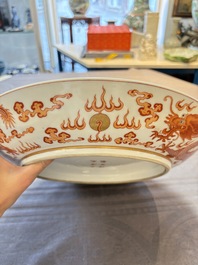 A Chinese gilt iron-red 'dragons and clouds' dish, Guangxu mark, 20th C.