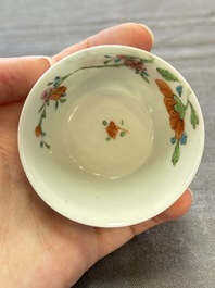 Seven Chinese famille rose cups and eleven saucers with floral design, Qianlong