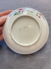 Seven Chinese famille rose cups and eleven saucers with floral design, Qianlong