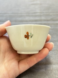 Seven Chinese famille rose cups and eleven saucers with floral design, Qianlong