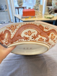 A Chinese gilt iron-red 'dragons and clouds' dish, Guangxu mark, 20th C.