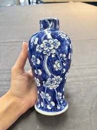 Three Chinese blue and white 'plum blossom' vases and covers, Kangxi mark, 19th C.