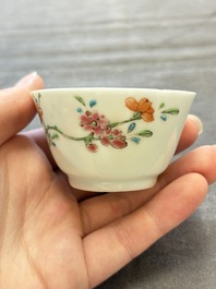 Seven Chinese famille rose cups and eleven saucers with floral design, Qianlong
