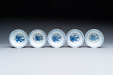 Five Chinese blue and white cups and saucers, Kangxi mark, 19th C.