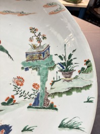 A large Chinese famille verte 'qilin and phoenix' dish, Kangxi