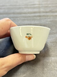 Seven Chinese famille rose cups and eleven saucers with floral design, Qianlong