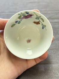 Seven Chinese famille rose cups and eleven saucers with floral design, Qianlong