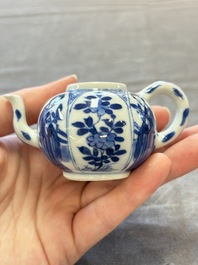 Three Chinese blue and white teapots, a cup and a saucer, Kangxi