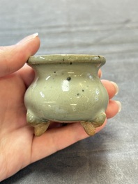 A small Chinese green-glazed 'jun' tripod censer, Hebi kilns, Song/Yuan