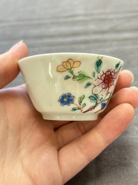 Seven Chinese famille rose cups and eleven saucers with floral design, Qianlong