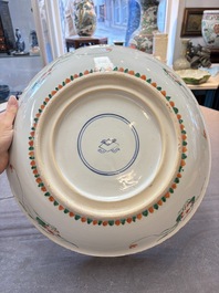 A large Chinese famille verte 'qilin and phoenix' dish, Kangxi
