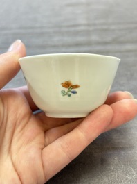 Seven Chinese famille rose cups and eleven saucers with floral design, Qianlong