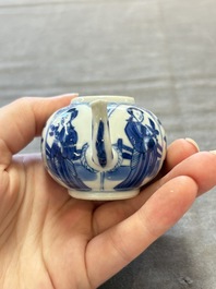 Three Chinese blue and white teapots, a cup and a saucer, Kangxi