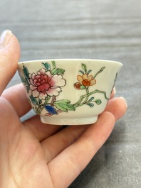 Seven Chinese famille rose cups and eleven saucers with floral design, Qianlong