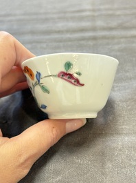 Seven Chinese famille rose cups and eleven saucers with floral design, Qianlong