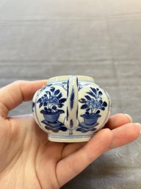 Three Chinese blue and white teapots, a cup and a saucer, Kangxi
