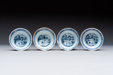 Four Chinese blue and white capucin-ground cups and saucers with landscape design, Yongzheng