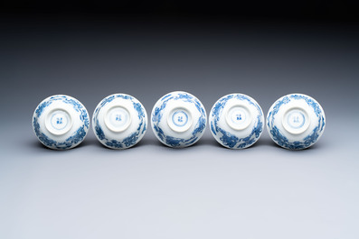 Five Chinese blue and white cups and saucers, Kangxi mark, 19th C.