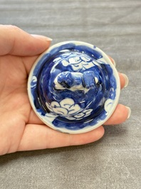 Three Chinese blue and white 'plum blossom' vases and covers, Kangxi mark, 19th C.