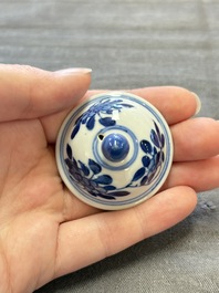 Three Chinese blue and white teapots, a cup and a saucer, Kangxi