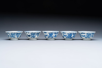 Five Chinese blue and white cups and saucers, Kangxi mark, 19th C.