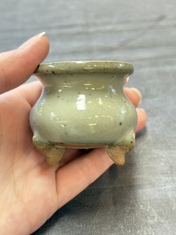 A small Chinese green-glazed 'jun' tripod censer, Hebi kilns, Song/Yuan
