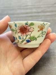 Seven Chinese famille rose cups and eleven saucers with floral design, Qianlong
