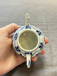 Three Chinese blue and white teapots, a cup and a saucer, Kangxi