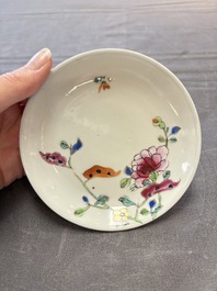 Seven Chinese famille rose cups and eleven saucers with floral design, Qianlong