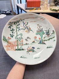 A large Chinese famille verte 'qilin and phoenix' dish, Kangxi