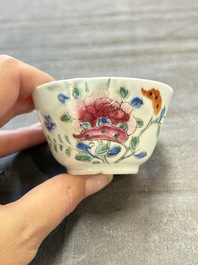 Seven Chinese famille rose cups and eleven saucers with floral design, Qianlong