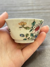 Seven Chinese famille rose cups and eleven saucers with floral design, Qianlong