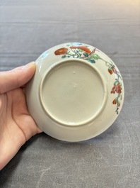Seven Chinese famille rose cups and eleven saucers with floral design, Qianlong