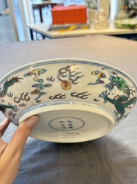 A Chinese doucai 'dragon' plate, Yongzheng mark and of the period