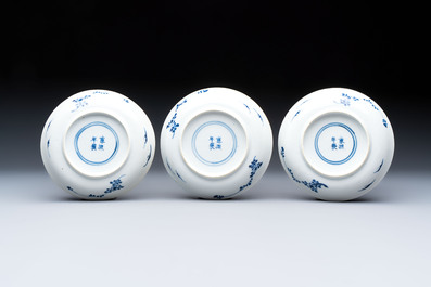 Five Chinese blue and white cups and saucers, Kangxi mark, 19th C.