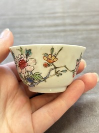 Seven Chinese famille rose cups and eleven saucers with floral design, Qianlong