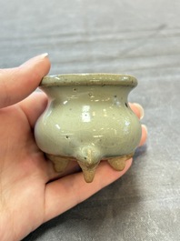 A small Chinese green-glazed 'jun' tripod censer, Hebi kilns, Song/Yuan