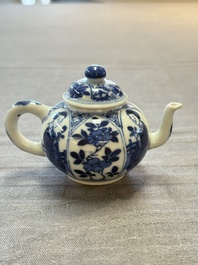 Three Chinese blue and white teapots, a cup and a saucer, Kangxi