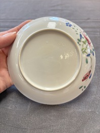 Seven Chinese famille rose cups and eleven saucers with floral design, Qianlong
