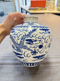 A Chinese blue and white 'dragon' vase, Kangxi mark, 19th C.