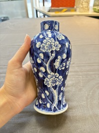 Three Chinese blue and white 'plum blossom' vases and covers, Kangxi mark, 19th C.