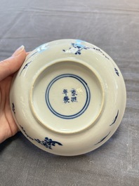 Five Chinese blue and white cups and saucers, Kangxi mark, 19th C.