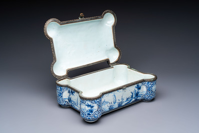 A blue and white Dutch Delft bronze-mounted casket, 19th C.