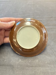 Four Chinese blue and white capucin-ground cups and saucers with landscape design, Yongzheng